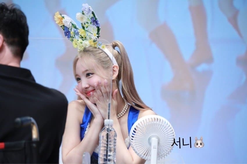 TWICE NAYEON gets dressed up at a fan signing event after a few years later