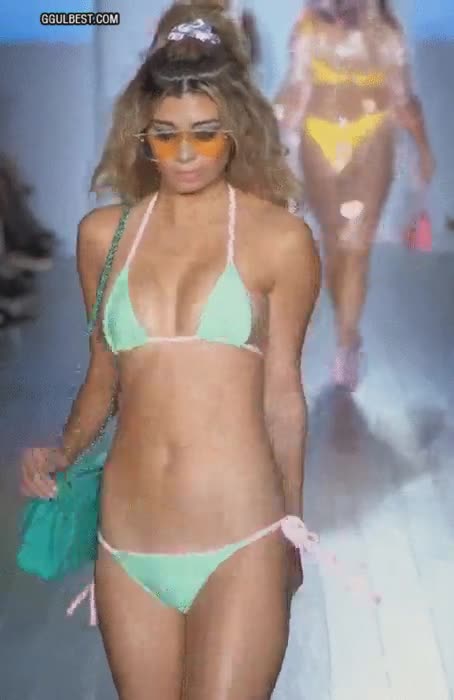 a fashion show in a body-shaping Western swimsuits
