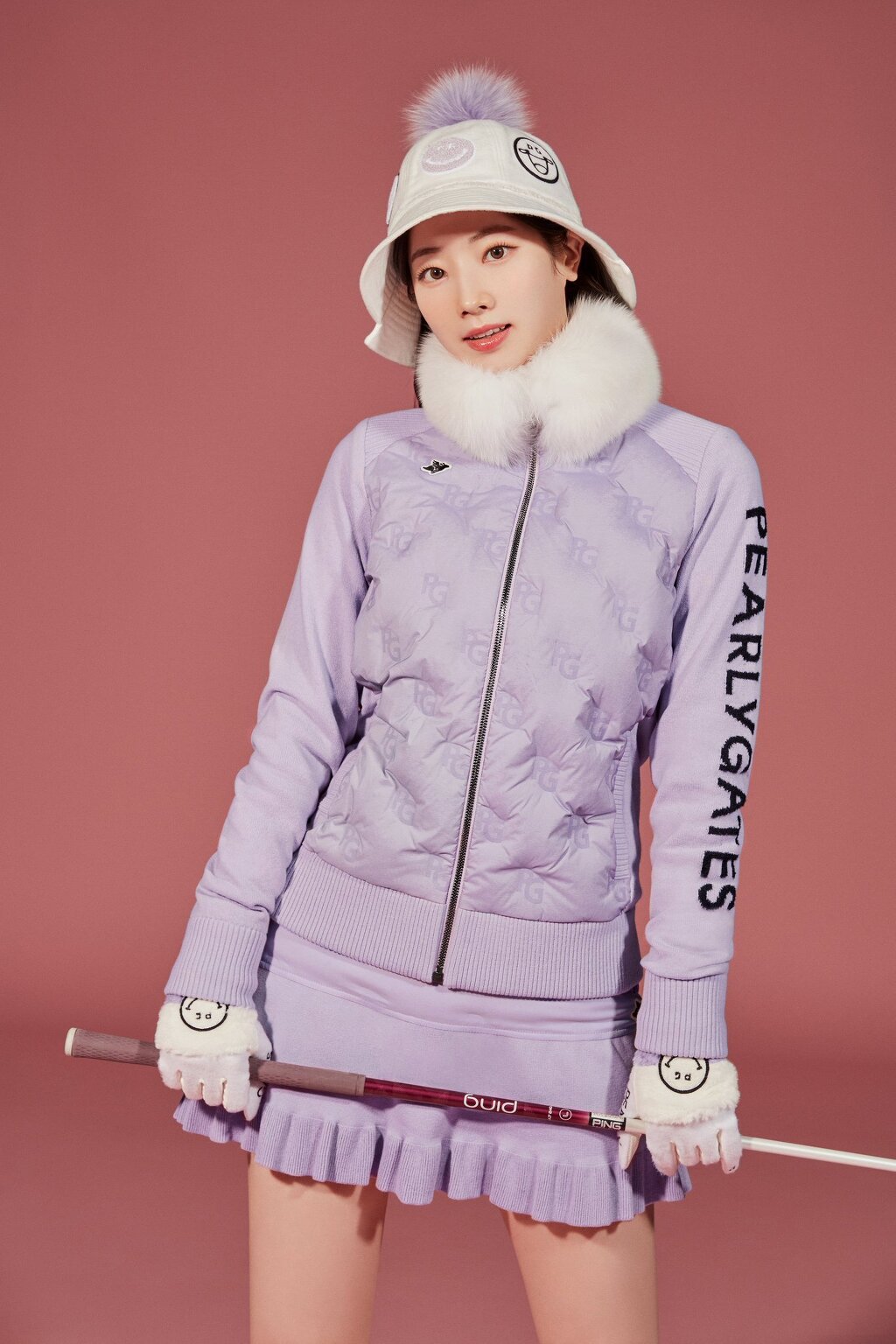 TWICE in a winter golf suit