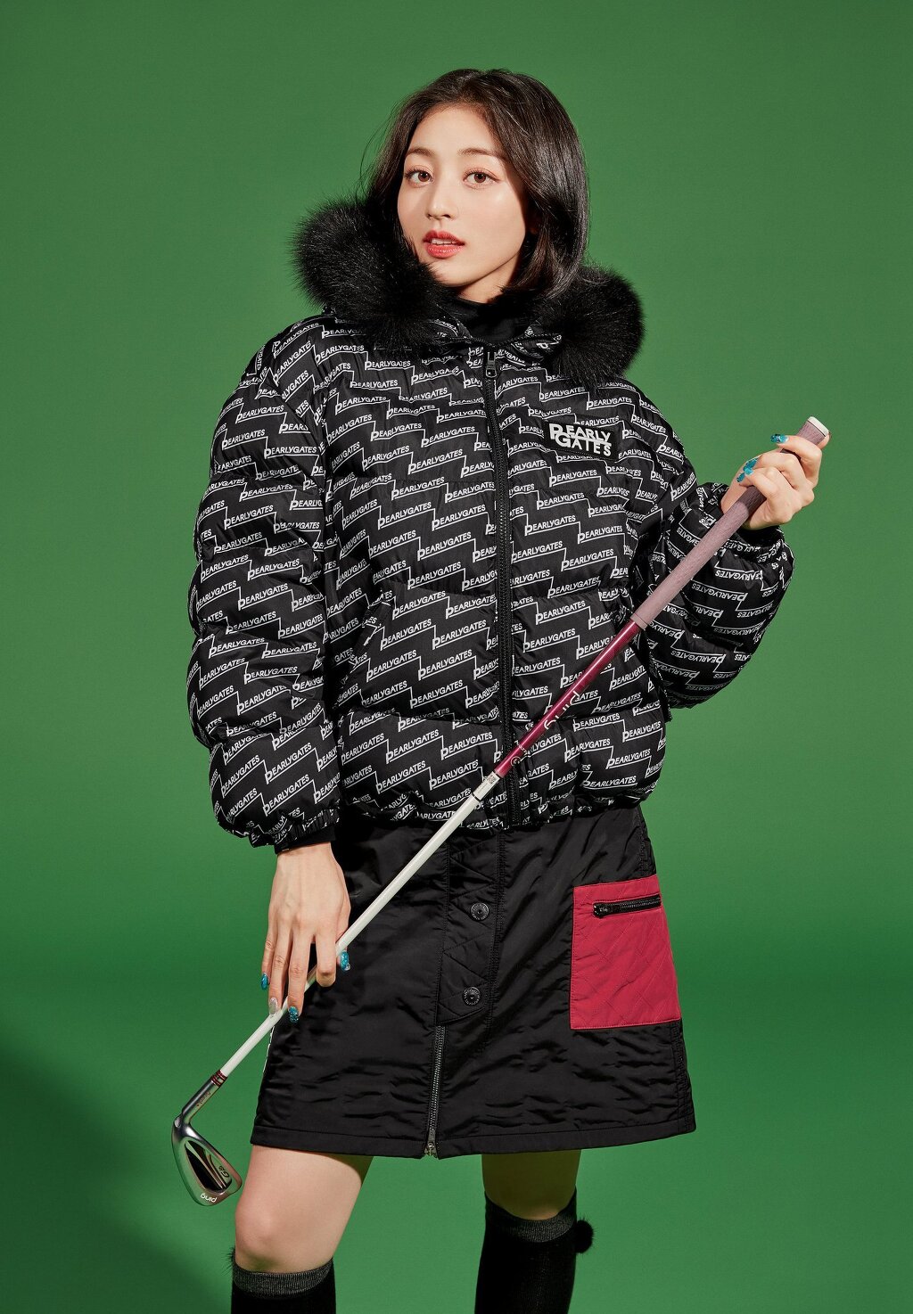 TWICE in a winter golf suit