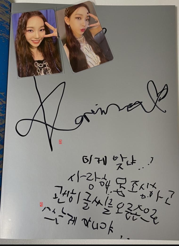 Fan asked Karina to sign her left hand.jpg