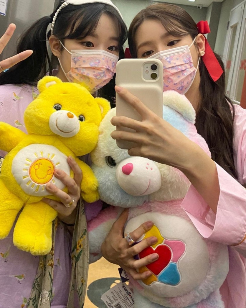 Miyeon, Shuhua, and slap-match in pajamas.