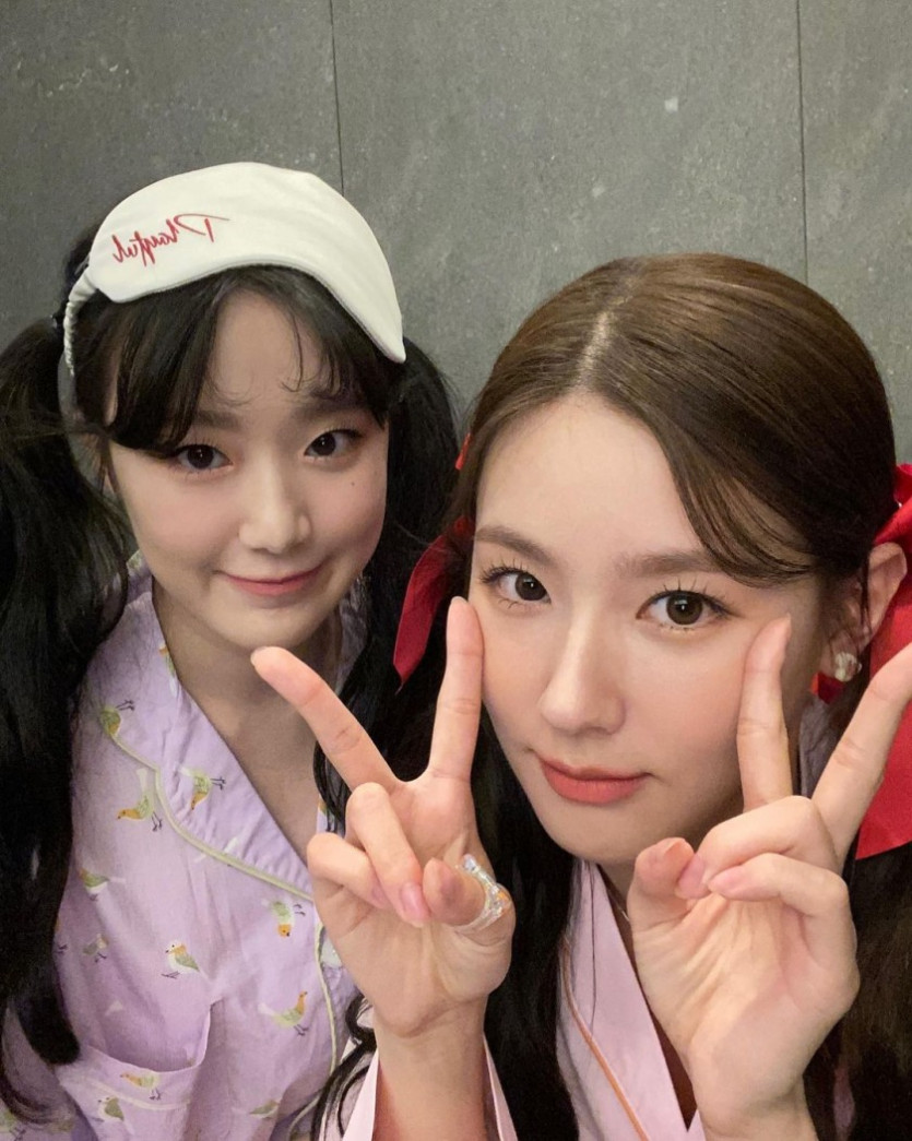 Miyeon, Shuhua, and slap-match in pajamas.