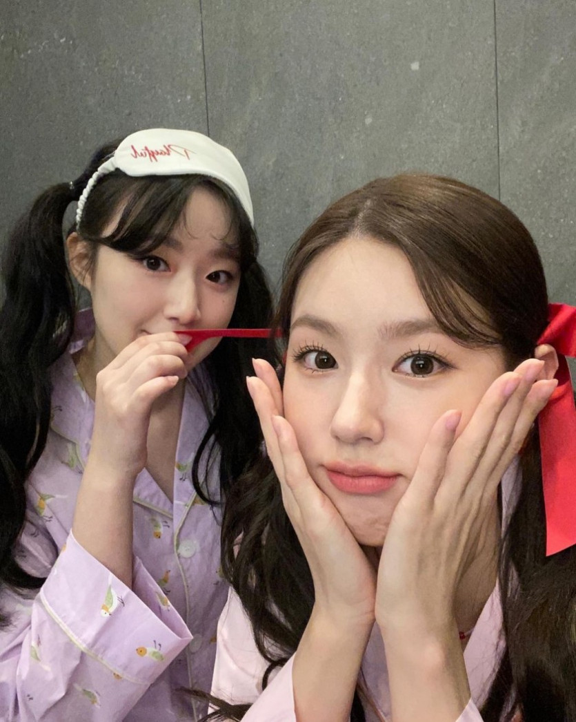 Miyeon, Shuhua, and slap-match in pajamas.