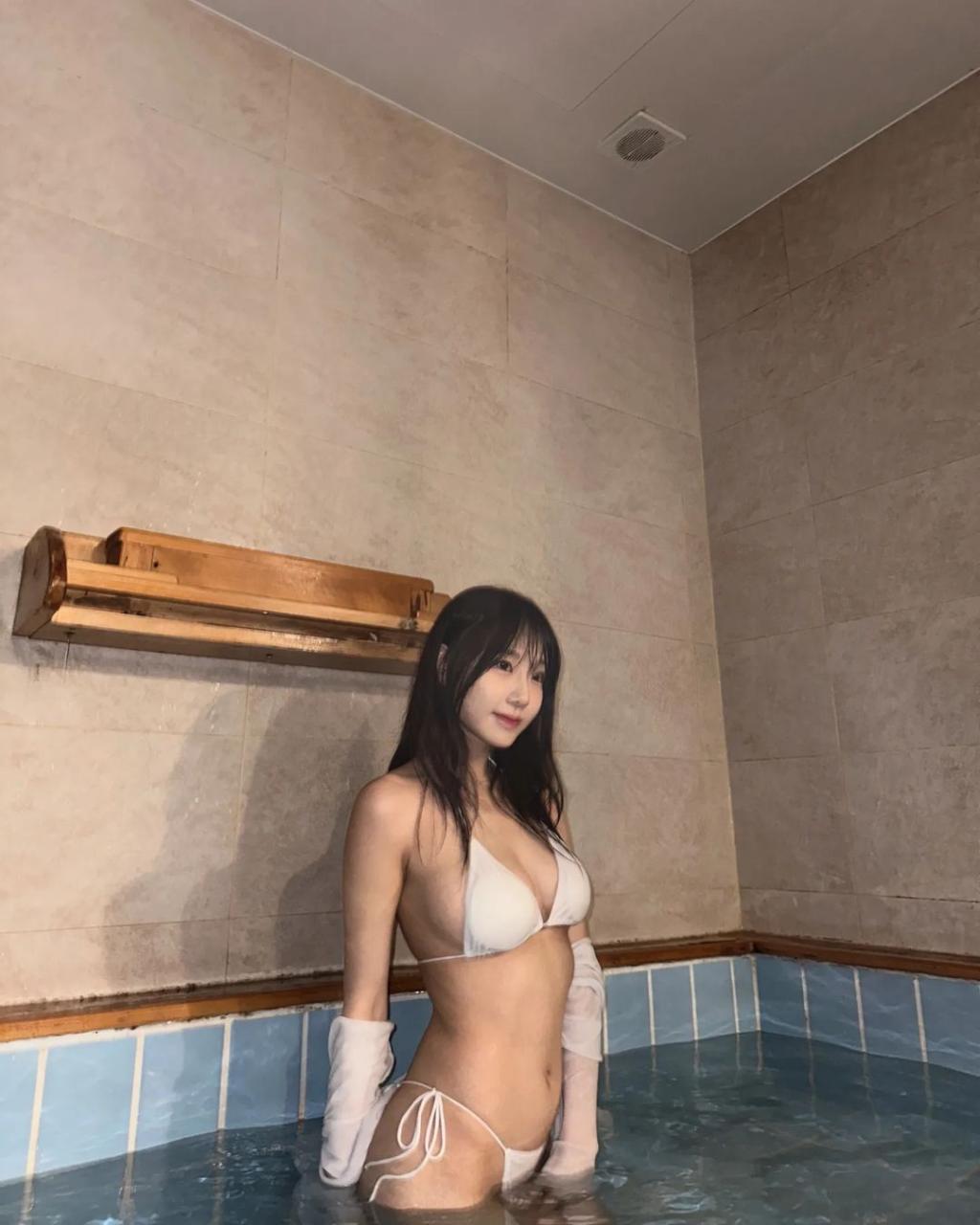 New training exercise bodystagram wearing white string bikini in the bath