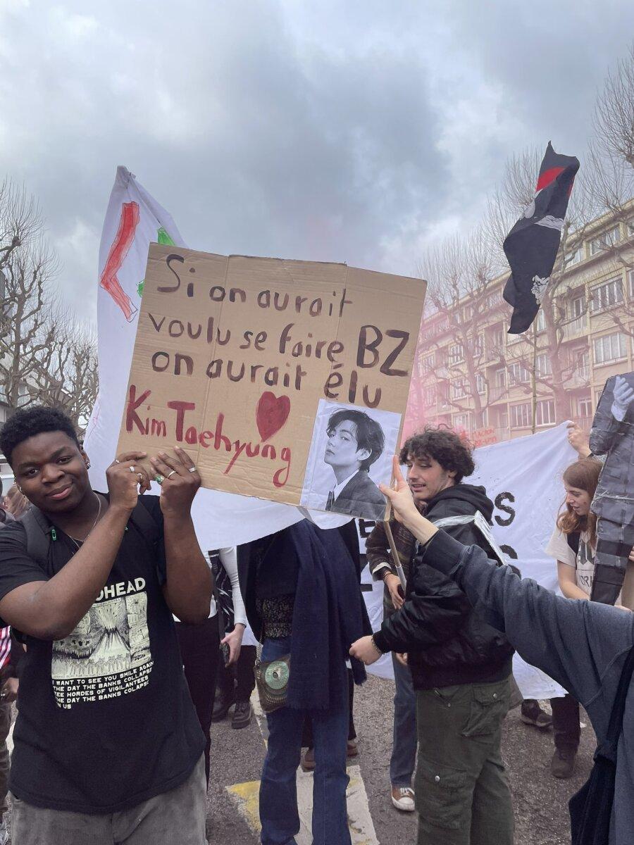 BTS V Appears in French Protest Sloganjpg