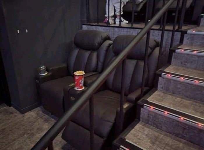 an over-the-line movie theater seat