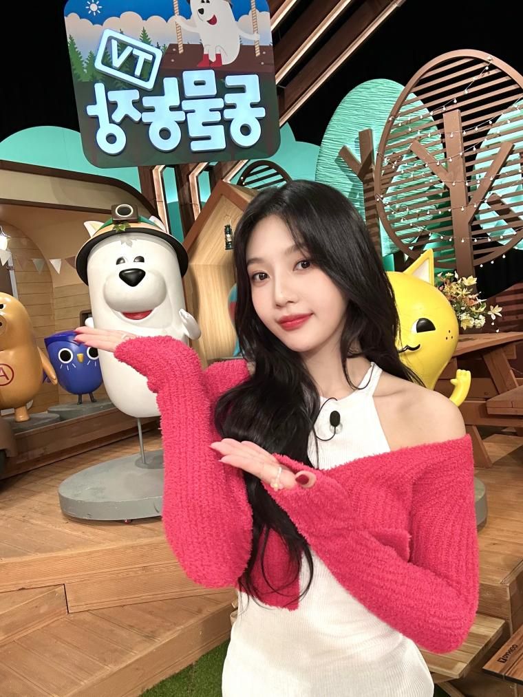 Joy with one shoulder exposed