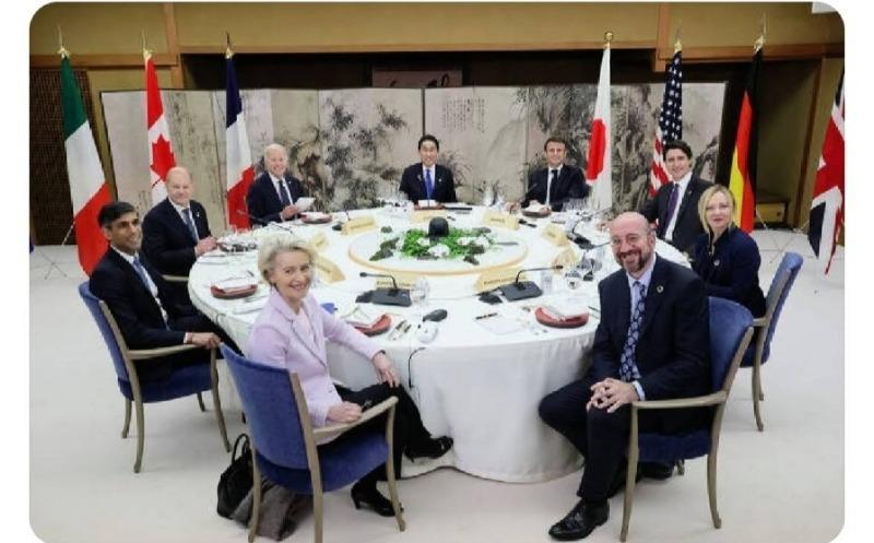 a commemorative photo of the leaders of nine countries