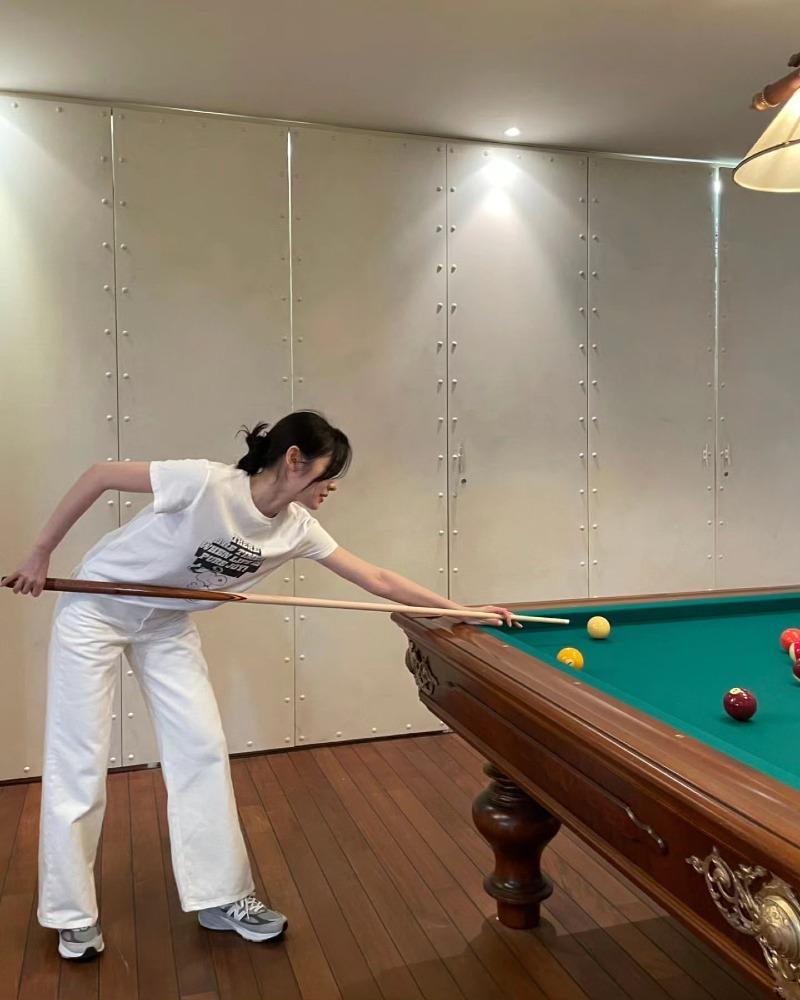 an unemployed person in a billiard room