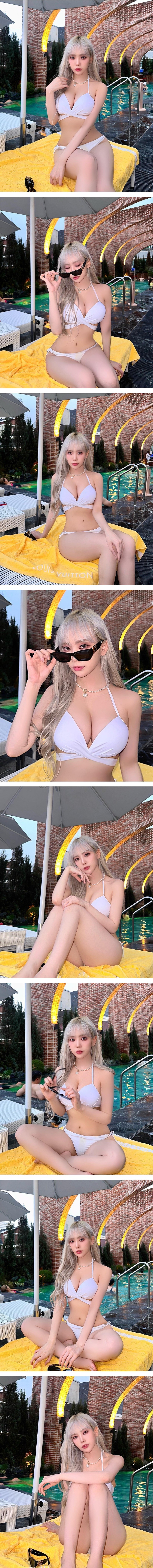 BJ Quindami who enjoys vacation wearing white string bikini