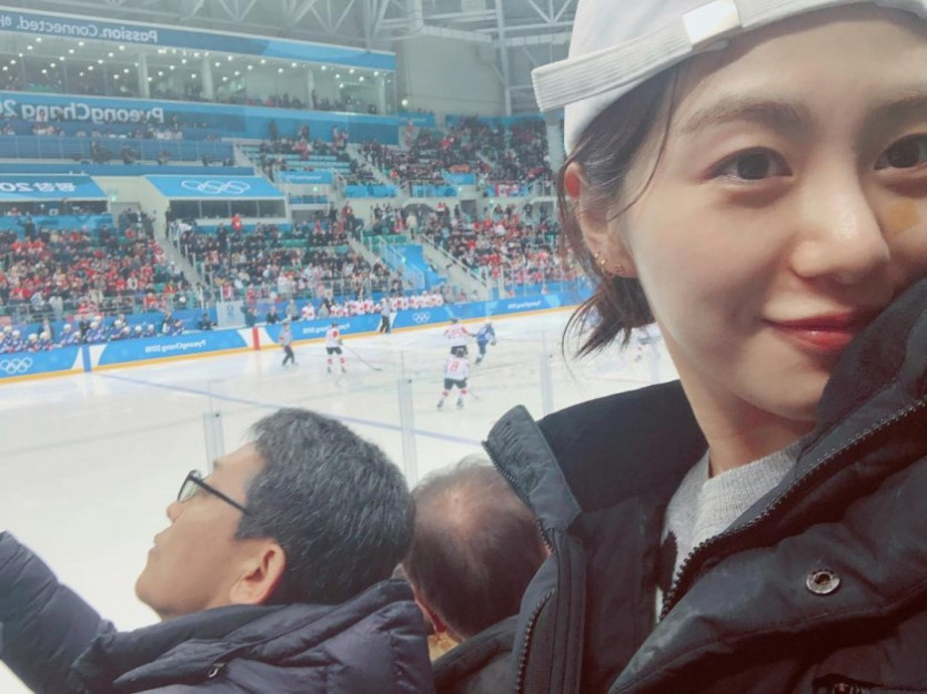AOA MINA watching the Olympic Games
