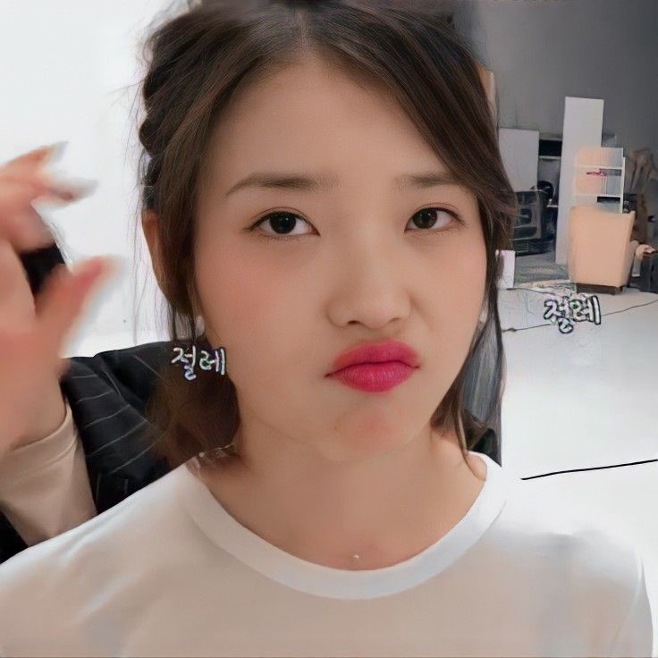 IU looks so cute even when she's angry and sulky