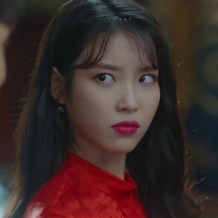 IU looks so cute even when she's angry and sulky