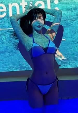 Parktilda's bikini body raised above her head