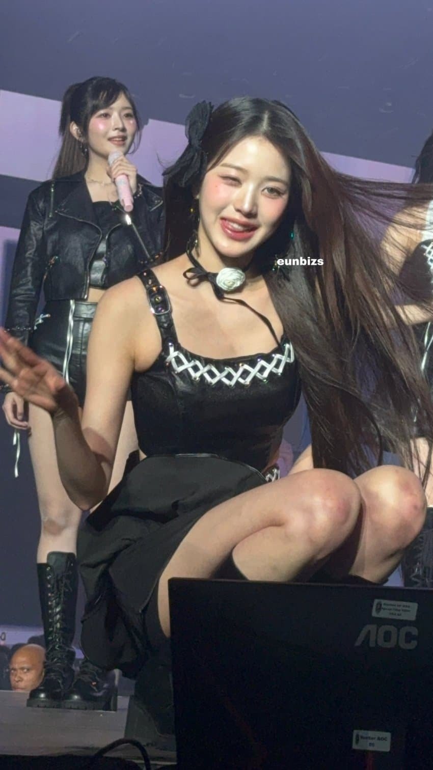 Jang Won-young drinking water at a concert in Brazil