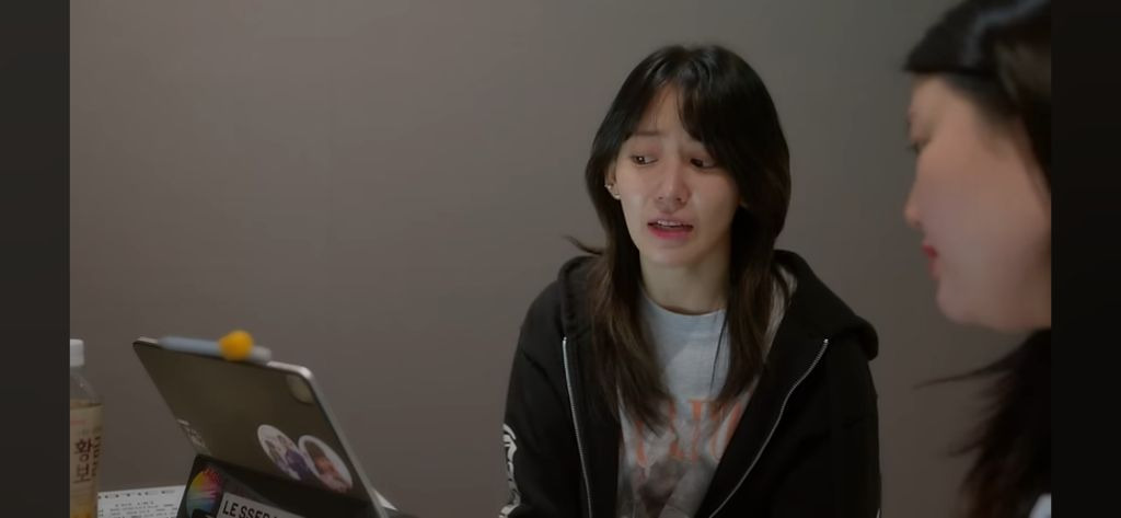 Sakura crying in the recently released Le Seraphim documentary