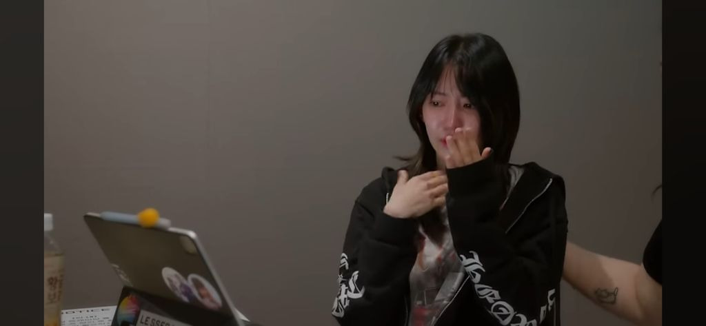 Sakura crying in the recently released Le Seraphim documentary