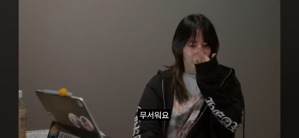 Sakura crying in the recently released Le Seraphim documentary