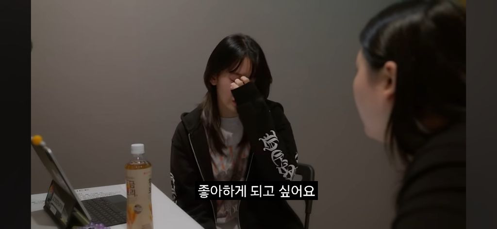 Sakura crying in the recently released Le Seraphim documentary