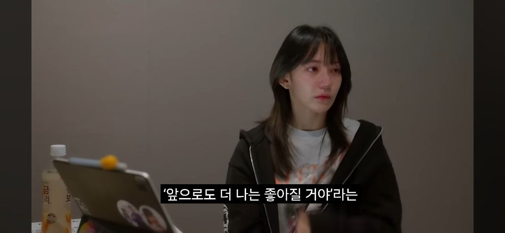 Sakura crying in the recently released Le Seraphim documentary