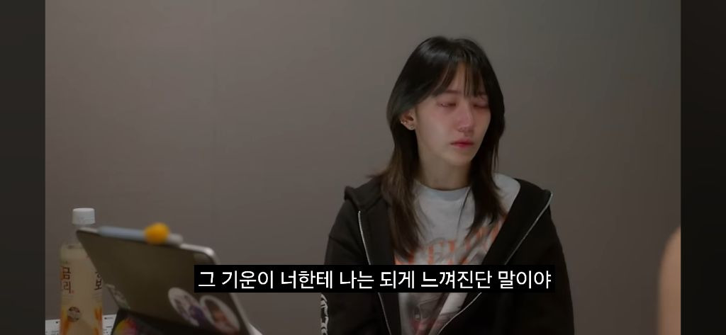 Sakura crying in the recently released Le Seraphim documentary