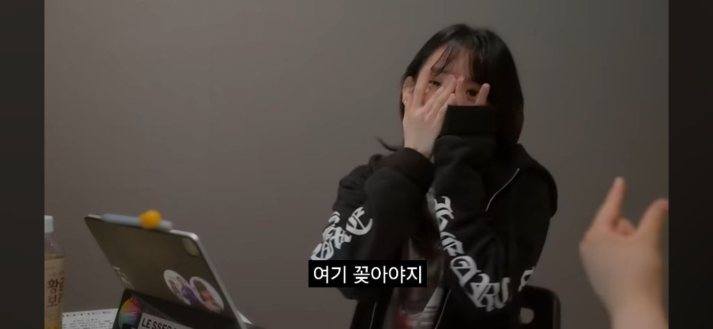 Sakura crying in the recently released Le Seraphim documentary