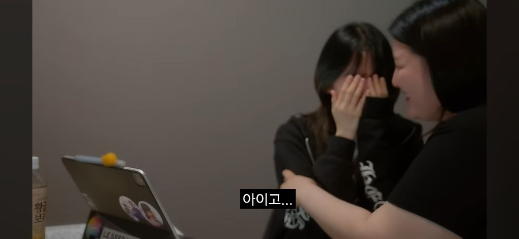 Sakura crying in the recently released Le Seraphim documentary