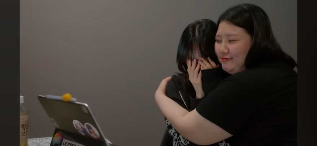 Sakura crying in the recently released Le Seraphim documentary