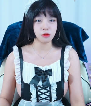 Yeoul's side boobs sticking out in a no-bra maid outfit