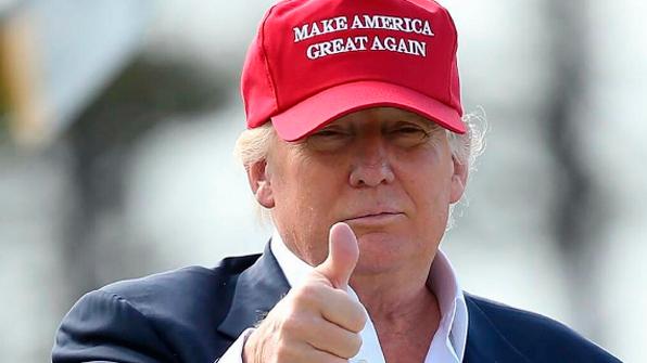 Lee Kwang-soo wearing a Trump supporter hat