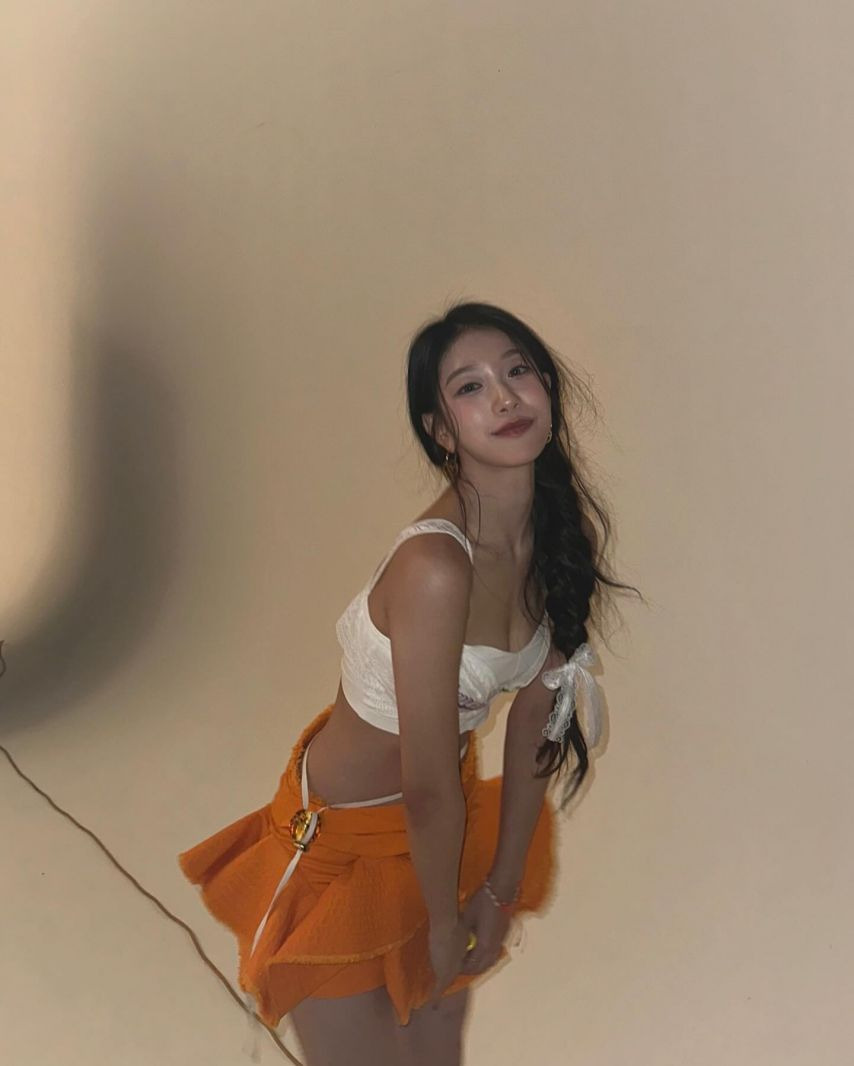 Seoyeon Lee's styling with a white lace bra top with subtle charm