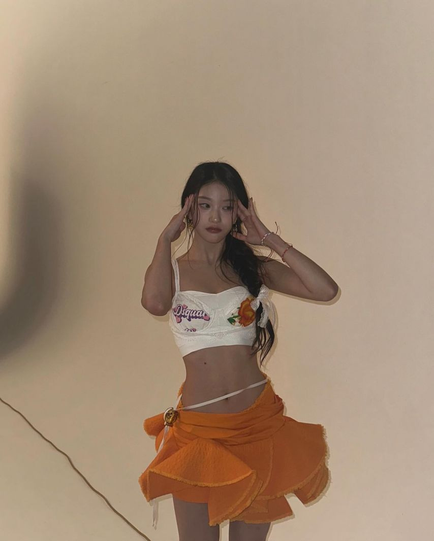 Seoyeon Lee's styling with a white lace bra top with subtle charm