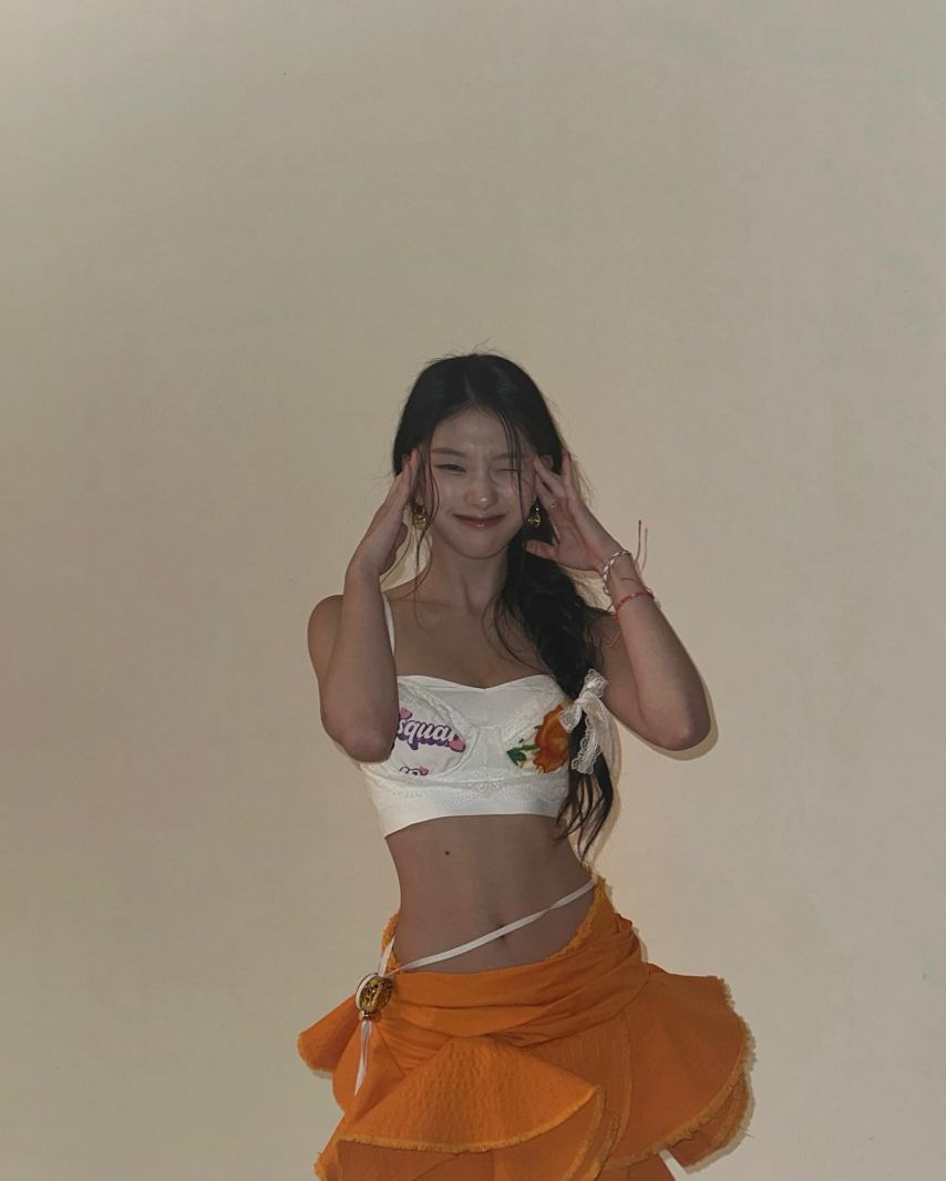 Seoyeon Lee's styling with a white lace bra top with subtle charm