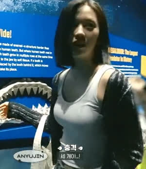 Ive went to the aquarium, An Yujin. Cool white sleeveless, bulging chest line.