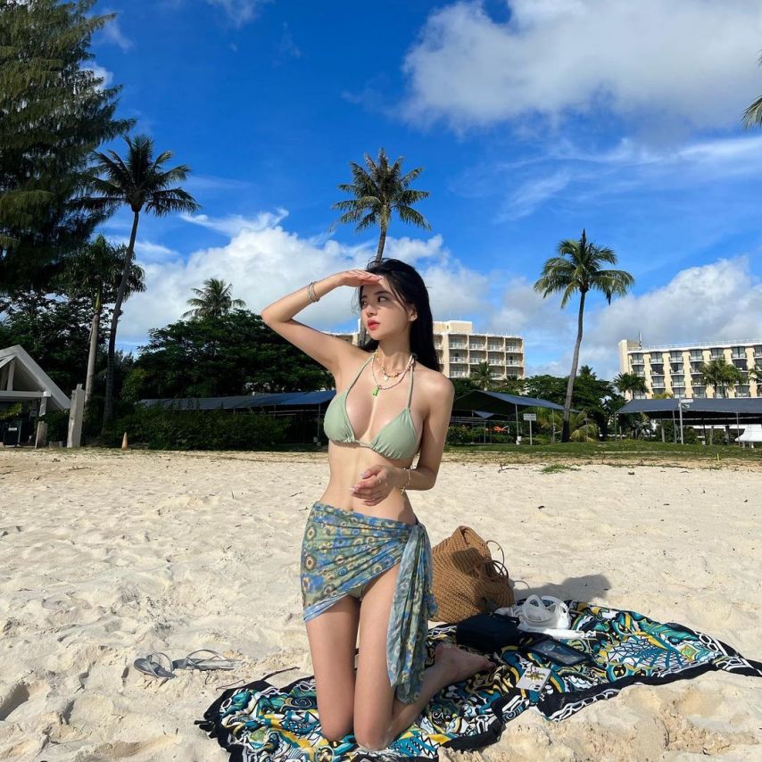 Saipan beach girl with amazing body in bikini