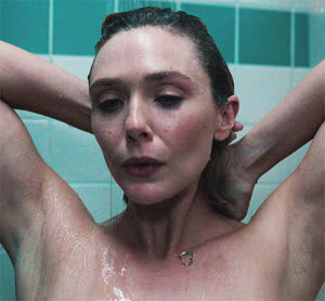 Elizabeth Olsen taking a shower, close-up of her armpits with a sharpie