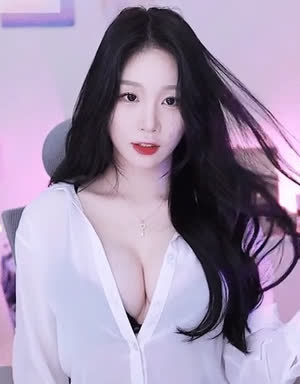 White shirt with one button unbuttoned, heavy cleavage