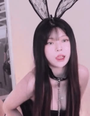 Yudi Kim’s sexy bunny cleavage with a neck strap