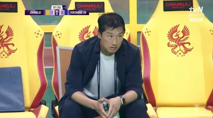 The expression of the coach of the team that is currently winning 7 to 3.jpg